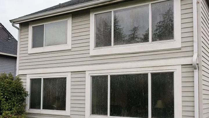 Exterior windows with dirt and streaks before cleaning in Bellevue, WA