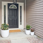 Small concrete porch attached to driveway