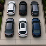 Three-car garage driveway with wide parking area