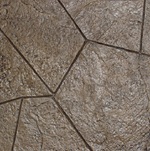Stamped concrete driveway with a decorative pattern
