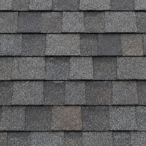 Close-up of gray asphalt shingle roofing