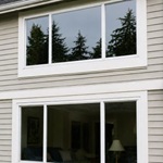 Exterior windows with dirt and streaks before washing